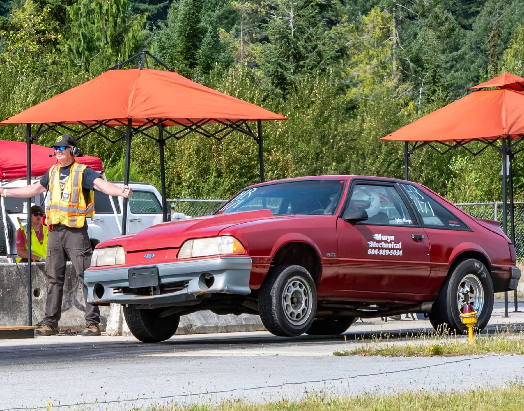 Tyler&rsquo;s Fox-body Mustang launching at the drag strip with the front wheels off the ground